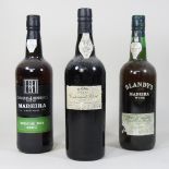 Three bottles of vintage Madeira wine,