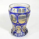 A 19th century Bohemian blue overlaid cut glass beaker, with gilt decoration,