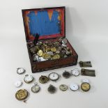 A collection of 19th century and later pocket watch and clock parts,