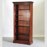 A reproduction standing open bookcase,