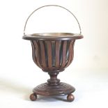A Dutch mahogany and satinwood strung peat bucket, with a brass liner,