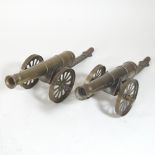 A pair of brass table cannons,