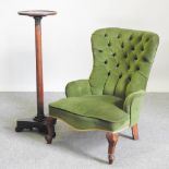 A Victorian green upholstered button back armchair,