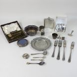 A collection of silver and plated items,