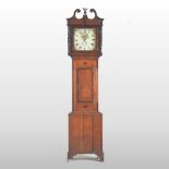 A late George III oak cased longcase clock, with a thirty hour movement, and a painted dial,