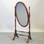 An Edwardian mahogany and satinwood strung cheval mirror,