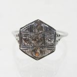 A large unmarked Art Deco style diamond cluster ring, set with five stones,
