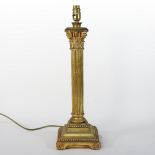 A gilt corinthian column table lamp, 53cm high,
