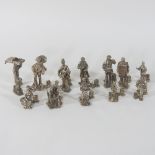 A set of twelve novelty silver place markers, each in the form of Cries of London figures,