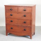 A Victorian stained pine chest of drawers, on bracket feet,