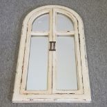 A white painted arched shutter mirror,