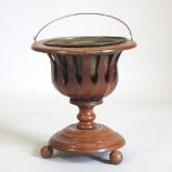 A 19th century mahogany peat bucket,