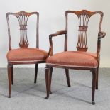 A set of six Edwardian mahogany dining chairs, with red padded seats,