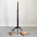 A mahogany torchere, 162cm high,