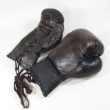 A pair of leather boxing gloves