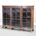 An early 20th century glazed mahogany dwarf breakfront bookcase,