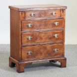 A bespoke made walnut bachelor's chest, on bracket feet,