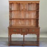 An 18th century style oak dresser,