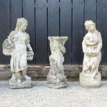 A reconstituted stone garden figure of a lady, 71cm high,