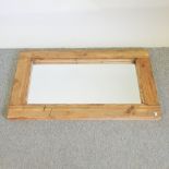 A rustic pine wall mirror,