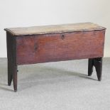 A 19th century elm six plank coffer,