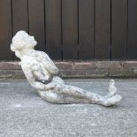 A reconstituted stone garden water feature, in the form a mermaid,
