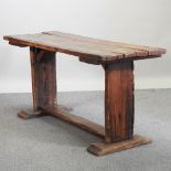 A 19th century and later pitch pine refectory table,