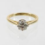 An 18 carat gold solitaire diamond ring, approximately 0.