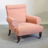 A Victorian pink upholstered Howard style armchair,