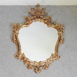 A gilt framed wall mirror,