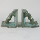 A pair of Art Deco Goebel green glazed book rests,