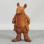 A rusted metal garden model of Mr Ratty,