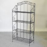 A set of black painted metal folding baker's shelves,