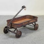 A 1960's American rusted metal trolley,