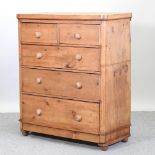 An antique pine chest of drawers,