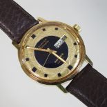 A 1960's Longines Admiral gold plated automatic wristwatch, having a signed blue enamel dial,