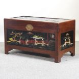 An early 20th century camphor wood chest, with oriental decoration,