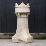 A crown top chimney pot,