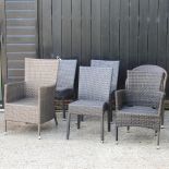 Six various rattan garden chairs
