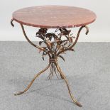 A rouge marble circular occasional table,