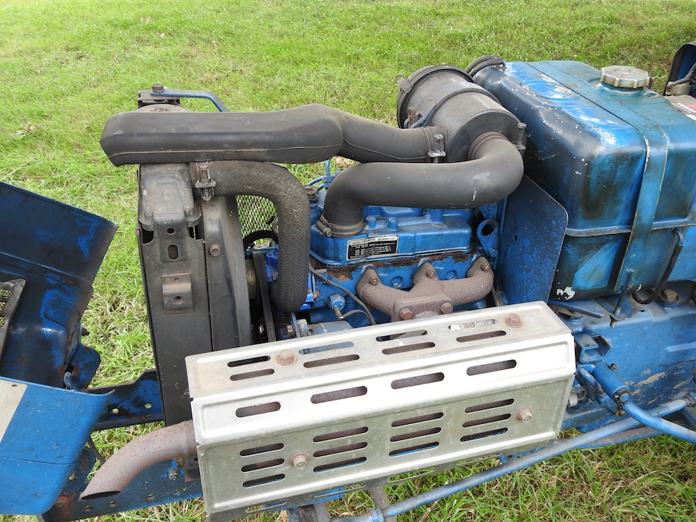 A barn find blue 1980's Ford 1210 compact tractor - Image 19 of 38