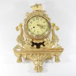 A modern gilt cartel style clock,