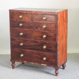 A 19th century Scottish mahogany and rosewood chest of drawers, on turned feet,