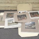 A folio of unframed prints