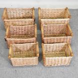 A set of three graduated wicker storage baskets, largest 47cm,