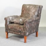 An early 20th century and recently brown floral upholstered armchair
