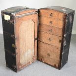 An early 20th century travelling trunk, with a fitted interior,