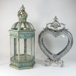 A silver painted metal lantern in the form of a heart, 53cm high,