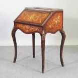 A reproduction French style marquetry bureau, on cabriole legs,