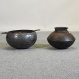 A modern steel water pot, together with a bowl,